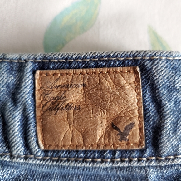 American Eagle High Waist Cut-Off Denim Shorts with Silver Glitter Star Pockets - Picture 8 of 9